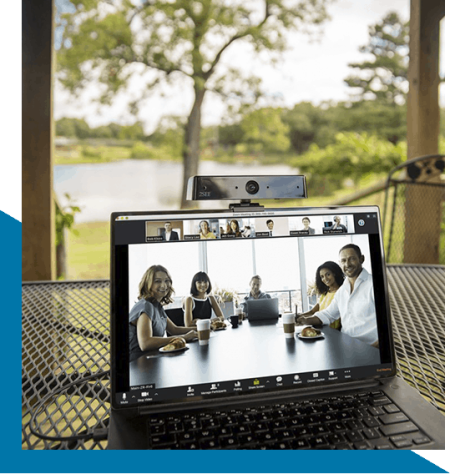 The VDO360 2SEE webcam mounts securely to a laptop for video conference calls.